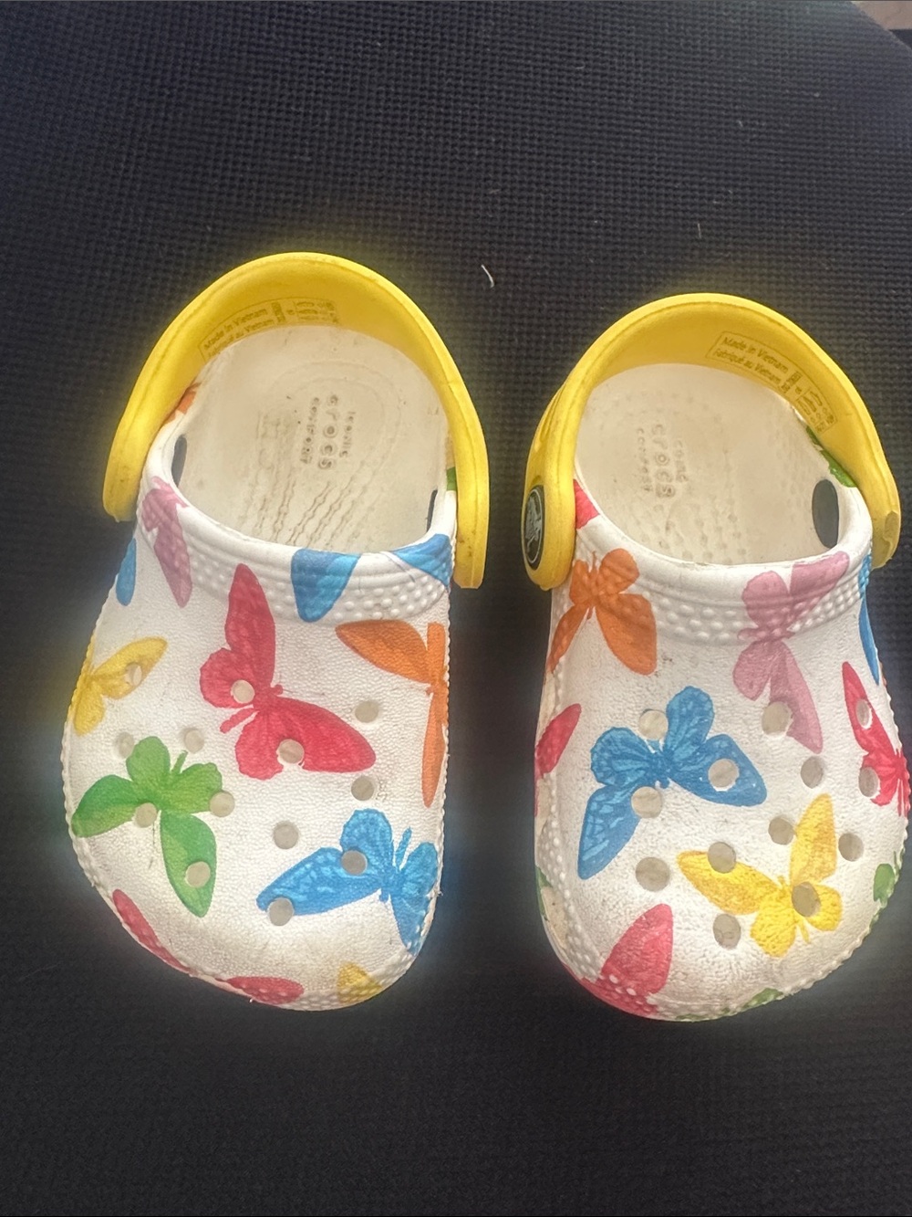 CROCS Kids White Clogs with Multicolor Butterfly Print and Yellow Straps